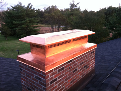 Before and after chimney cap replacement in Valley Stream, NY