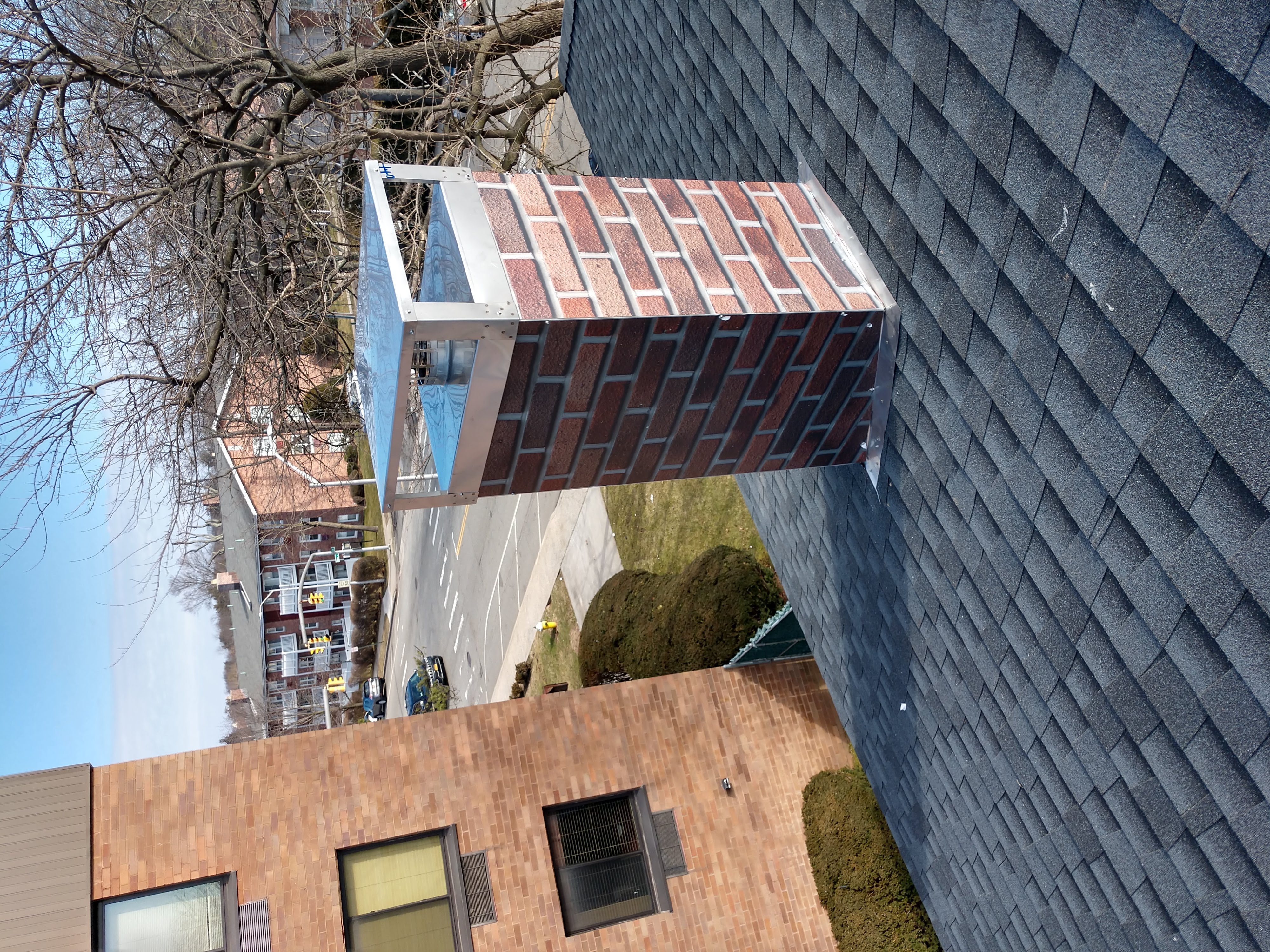 New elastomeric sealant applied to chimney crown in Valley Stream, NY