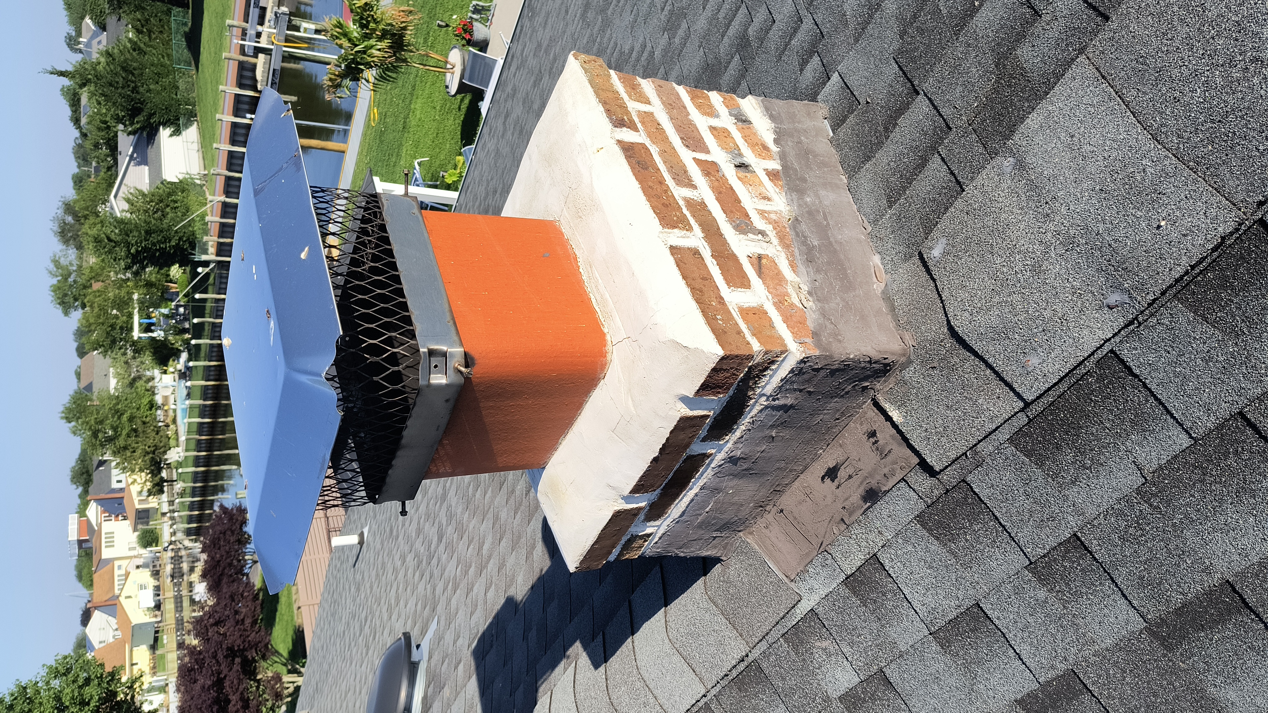 Full chimney masonry rebuild and restoration in Valley Stream, NY