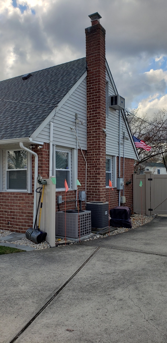 Professional chimney repointing restoring brick joints in Valley Stream, NY