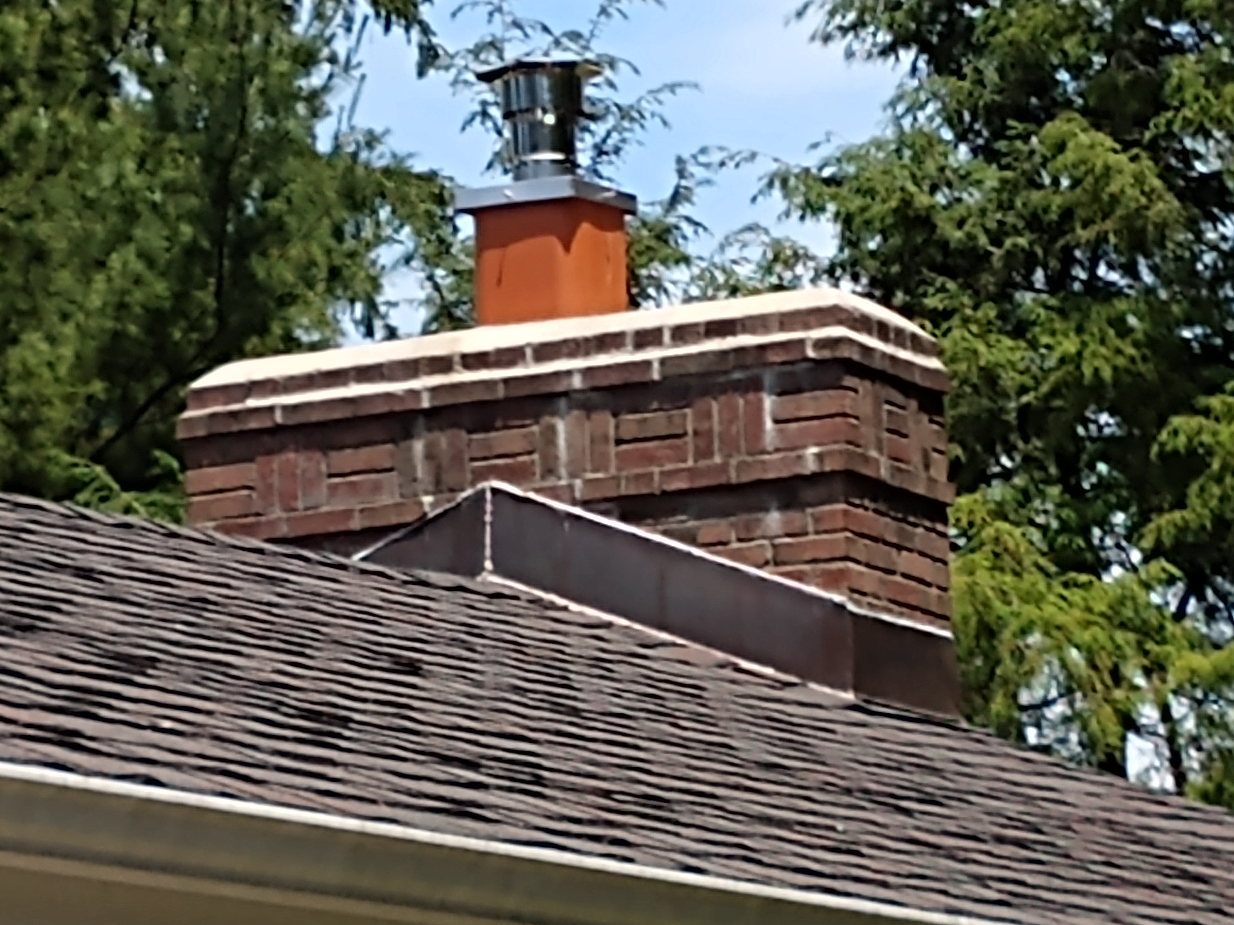 Stainless steel chimney cap with animal guard in Valley Stream, New York